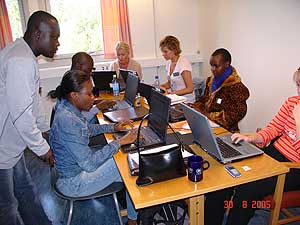 DM students working F2F and in virtual group rooms